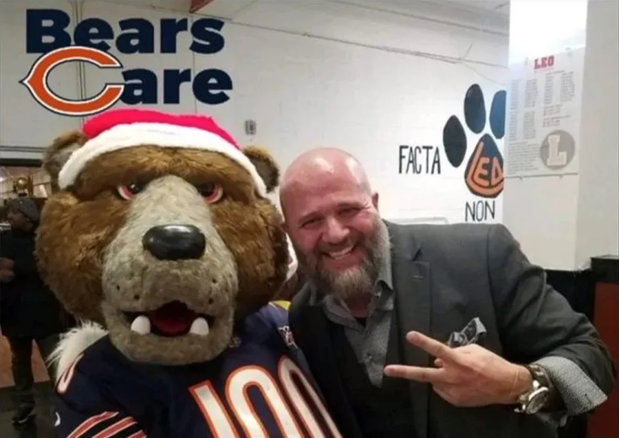 Mike DiDomenico with Chicago Bears mascot Staley Da Bear at Bears Care holiday event